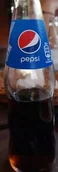 Soki i napoje niegazowane - Pepsi Cola w szklanej butelce zwrotnej 200 ml - miniaturka - grafika 1