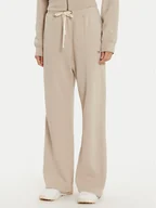 Spodnie sportowe damskie - Champion Spodnie dresowe 117638 Beżowy Wide Leg - miniaturka - grafika 1