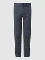 Spodnie męskie - Spodnie o kroju tapered fit z dodatkiem streczu model ‘Mark’ - miniaturka - grafika 1