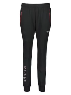 Spodnie sportowe damskie - Mizuno Spodnie dresowe "Heritage" w kolorze czarnym - grafika 1