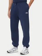 Spodnie sportowe męskie - The North Face Spodnie dresowe Essential NF0A8C1F Granatowy Relaxed Fit - miniaturka - grafika 1