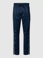 Spodnie sportowe męskie - Spodnie dresowe z logo na całej powierzchni model ‘Datalas’ - miniaturka - grafika 1