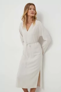 Sukienki - Calvin Klein sukienka kolor beżowy midi oversize - grafika 1