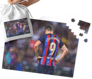 PUZZLE - Robert Lewandowski WZORY DLA MAŁEGO PIŁKARZA 110EL + WORECZEK - Puzzle - miniaturka - grafika 1
