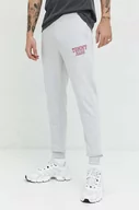 Spodnie męskie - Tommy Jeans spodnie dresowe bawełniane kolor szary z nadrukiem - miniaturka - grafika 1