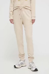 Spodnie damskie - Armani Exchange spodnie dresowe bawełniane kolor beżowy gładkie - grafika 1