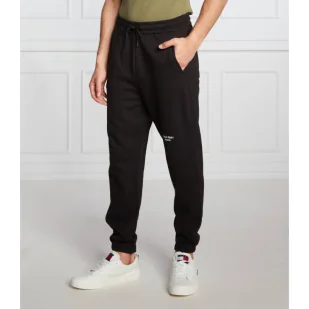 CALVIN KLEIN JEANS Spodnie dresowe | Regular Fit - Dresy męskie - miniaturka - grafika 1