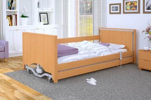 Łóżko rehabilitacyjne regulowane  TAURUS 2 LOW LUX z możliwością obniżenia pozycji leża i z zabudowanymi szczytami RehaBed : Rodzaj leża - Metalowe, Standardowe kolory ramy łóżka - Buk, Stolik typu Tablet: - Tak, Wysięgnik (max odciążenie 80 kg): - Tak - Akcesoria dla osób starszych i niepełnosprawnych - miniaturka - grafika 1