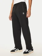 Spodnie sportowe męskie - adidas Spodnie dresowe Monogram IZ2539 Czarny Regular Fit - miniaturka - grafika 1