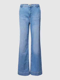 Spodnie damskie - Jeansy z bocznymi wpuszczanymi kieszeniami - grafika 1