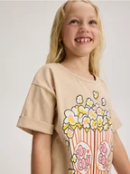 Koszulki dla dziewczynek - Reserved - T-shirt z nadrukiem - beżowy - miniaturka - grafika 1