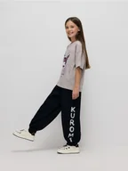 Spodnie i spodenki dla dziewczynek - Reserved - Spodnie dresowe Kuromi - czarny - miniaturka - grafika 1