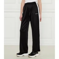 Dresy damskie - Guess Jeans Spodnie dresowe TRICOT Relaxed fit - miniaturka - grafika 1