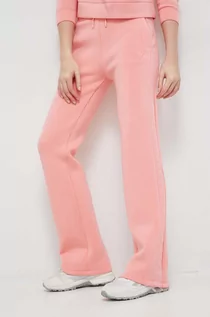 Spodnie damskie - Guess spodnie dresowe damskie kolor różowy z nadrukiem - grafika 1