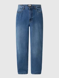 Spodnie męskie - Jeansy o luźnym kroju z bawełny - grafika 1