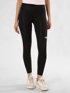 Legginsy - The North Face Legginsy Kobiety Sztuczne włókno czarny jednolity, S - miniaturka - grafika 1