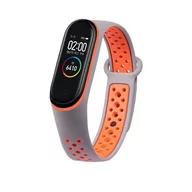 Akcesoria do smartwatchy - Hurtel Zamienna silikonowa opaska pasek do Xiaomi Mi Band 5 Dots szaro-pomarańczowy - miniaturka - grafika 1