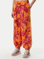 Spodnie sportowe damskie - adidas Spodnie dresowe FARM Premium JD6301 Pomarańczowy Loose Fit - miniaturka - grafika 1