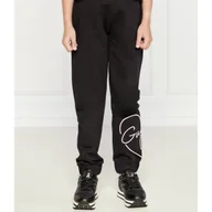 Spodnie sportowe damskie - Guess Spodnie dresowe ACTIVE | Regular Fit - miniaturka - grafika 1