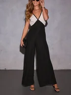 Kombinezony - Milan Kiss Kombinezon w kolorze czarno-białym - miniaturka - grafika 1