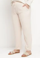 Spodnie damskie - Jasnobeżowe Casualowe Spodnie z Elastyczną Gumką w Pasie z Wsuwanymi Kieszeniami Mousesa - miniaturka - grafika 1