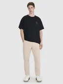 Spodnie sportowe męskie - 4F Spodnie dresowe męskie - beżowe M - miniaturka - grafika 1