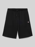 Spodnie i spodenki dla chłopców - Szorty z dzianiny dresowej o kroju regular fit z nadrukiem z logo - miniaturka - grafika 1