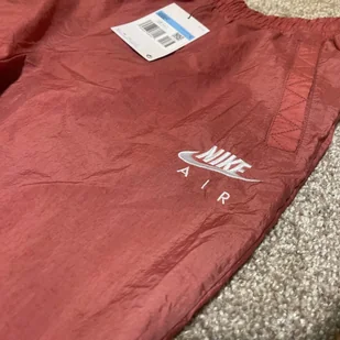 NIKE SPODNIE SPORTOWE DAMSKIE R. XL CEGLASTE CIENKIE KIESZENIE WIĄZANIE - Dresy damskie - miniaturka - grafika 1