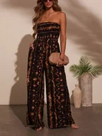 Kombinezony - Milan Kiss Kombinezon w kolorze jasnobrązowo-czarnym - miniaturka - grafika 1