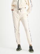 Spodnie sportowe damskie - Steve Madden Spodnie dresowe "New York Story" w kolorze kremowym - miniaturka - grafika 1