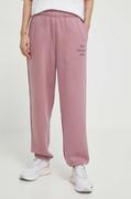 Spodnie damskie - New Balance spodnie dresowe kolor różowy gładkie WP41508RSE - miniaturka - grafika 1