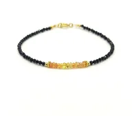 Bransoletki - Pozłacana bransoletka z szafirami - miniaturka - grafika 1