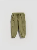 Spodenki dla niemowląt - Reserved - Wysokoelastyczne joggery cargo - zielony - miniaturka - grafika 1