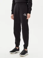 Spodnie sportowe damskie - Calvin Klein Jeans Spodnie dresowe Monologo J20J225354 Czarny Slim Fit - miniaturka - grafika 1