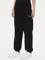 Spodnie sportowe damskie - Calvin Klein Jeans Spodnie dresowe Monologo LV047B235G Czarny Regular Fit - miniaturka - grafika 1