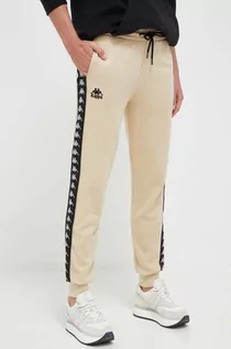 Spodnie damskie - Kappa spodnie dresowe kolor beżowy z aplikacją - grafika 1