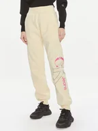 Spodnie sportowe damskie - Calvin Klein Jeans Spodnie dresowe Bold Monologo J20J222606 Żółty Relaxed Fit - miniaturka - grafika 1