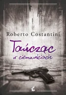 Kryminały - Tańcząc w ciemnościach - Roberto  Costantini - ebook - miniaturka - grafika 1