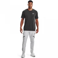 Spodnie sportowe męskie - Męskie spodnie treningowe UNDER ARMOUR UA UNSTOPPABLE CARGO PANTS - białe - miniaturka - grafika 1