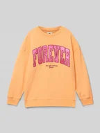 Bluzy dla dziewczynek - Bluza o kroju oversized z nadrukiem z logo - miniaturka - grafika 1