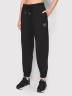 Spodnie sportowe damskie - Puma Spodnie dresowe SWxP 533567 Czarny Relaxed Fit - miniaturka - grafika 1