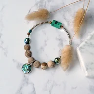 Bransoletki - INTERESUJĄCA BRANSOLETKA z zawieszką i jaspisem - miniaturka - grafika 1