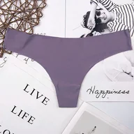 Majtki damskie - Różnokolorowe gładkie stringi - L Fioletowy - miniaturka - grafika 1