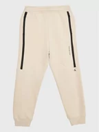Spodnie i spodenki dla dziewczynek - Calvin Klein Jeans Spodnie dresowe Seaming Skater IB0IB01506 Beżowy Regular Fit - miniaturka - grafika 1