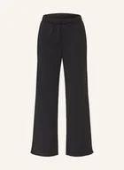 Spodnie damskie - Under Armour Spodnie Dresowe Ua Icon Vida schwarz - UNDER ARMOUR - miniaturka - grafika 1