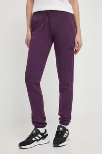 Spodnie damskie - The North Face spodnie dresowe bawełniane kolor fioletowy gładkie NF0A87E4V6V1 - grafika 1