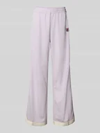 Spodnie sportowe damskie - Spodnie typu track pants z prostą nogawką i naszywką z logo model ‘LORCE’ - miniaturka - grafika 1