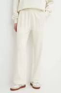 Spodnie damskie - Tommy Hilfiger spodnie dresowe bawełniane kolor beżowy gładkie WW0WW41573 - miniaturka - grafika 1