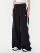 Spodnie sportowe damskie - adidas Spodnie dresowe adicolor 3-Stripes JV7473 Czarny Wide Leg - miniaturka - grafika 1