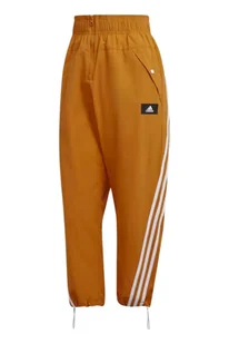 Spodnie damskie AdidasFuture Icons dresowe pomarańczowe -S - Spodnie damskie - miniaturka - grafika 1
